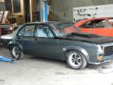 Torana_with_glass.jpg